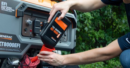 Generac open frame portable generator getting new engine oil