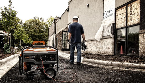 Generac open frame portable generator being used on a construction site